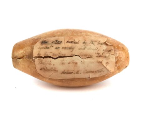 Niue, Savage Island war stone or Maka with old paper label reading, " War Stone hurled by the hand against the enemy with dea