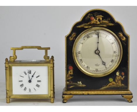 An early-mid 20th century Elliott mantel clock, the shaped, Japanned case raised on four shaped feet (18.5cm high) and a smal