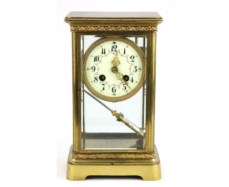 A brass four glass mantel clock, early 20th Century, the case with beaded cornice, with two foliate scrolling bands, the ivor