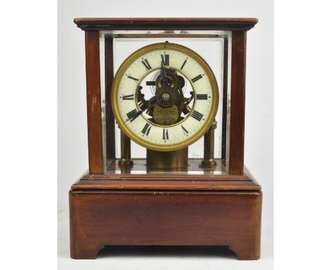 A late Victorian Eureka mahogany and glass cased mantel clock, by the Eureka Clock Co. Ltd. London, No 3775, with white ename