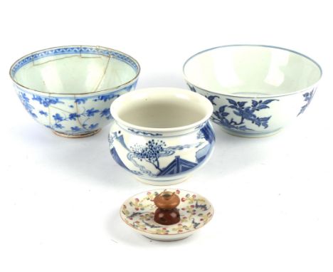 A famille rose candle holder, decorated with bats in blue enamel, about 12.5 cm diameter; together with three pieces of blue 