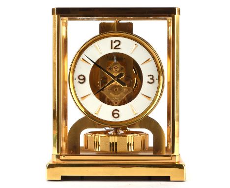 A JAEGER-LECOULTRE ATMOS CLOCK, Serial number 399379, the white chapter ring with numerals to the quarters, within a glass pa