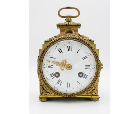 A Louis XVI style, 'Pendule d' Officer' brass cased mantel clock, C.1900, with single loop handle over a square case, relief 