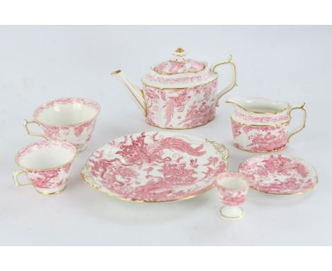 A Royal Crown Derby pink Aves pattern bone china part dinner/tea service: to comprise a teapot and cover, four sugar bowls, t