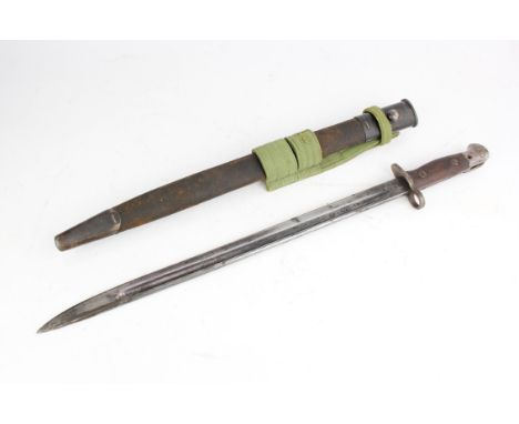 A British World War One 1907 pattern Wilkinson bayonet complete with leather scabbard.Note: You must be over 18 to purchase t