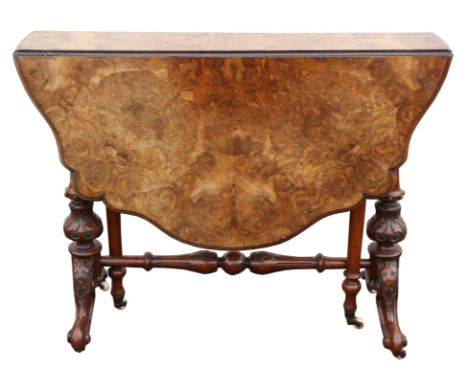 A Victorian walnut Sutherland table, with two flaps, on turned bulbous legs, with ceramic casters, H72 x W107 x D93cm 