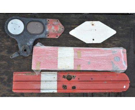 Two tin-plate and enamel railway signal arms, one enamelled in red and white livery, the other in black-and-white delivery, t