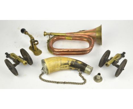 A copper and brass mounted bugle by Boosey and Hawkes, stamped with military crows foot and dated 1937 with applied regimenta