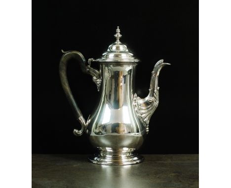 A George III silver coffee pot, William Cripps, London 1761, of plain polished baluster form with ebonised turned handle, dom