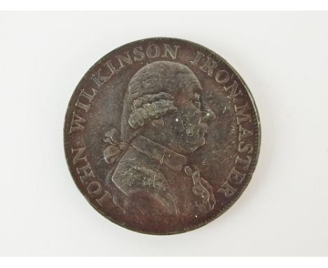 An 18th century Warwickshire token, John Wilkinson, Iron Master, dated 1792, within capsule and case