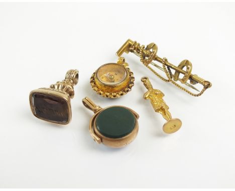 A smoky quartz set seal fob, with engraved intaglio 'Elizabeth', together with a quartz swivel fob, a bloodstone set compass,