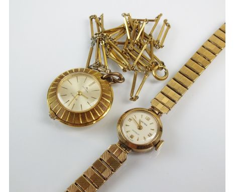 A Lady's 9ct gold Netex bracelet watch, the circular white dial with gold Arabic numerals and batons, manual wind, with attac