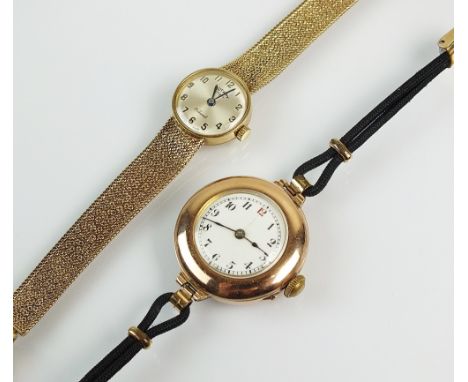 A Lady's 9ct gold Rotary bracelet watch, the circular silvered dial with Arabic numerals, manual wind, the integral tapered b
