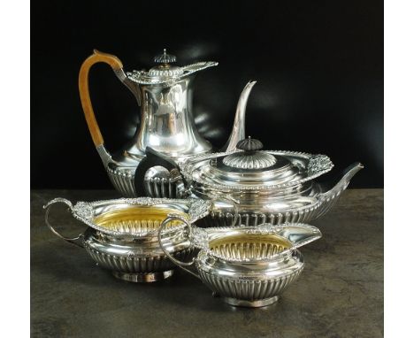 A Victorian matched four piece silver tea and coffee service, Walter & John Barnard, London 1892, each piece of circular half