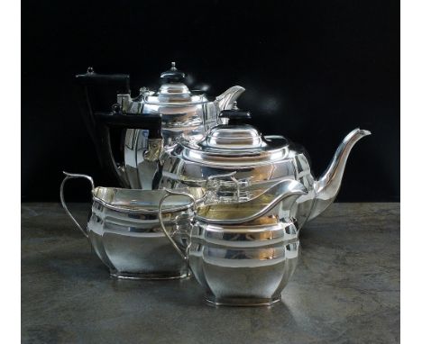 A four piece silver tea service, S Blanckensee & Sons Ltd, Chester 1937, each piece of plain polished oval canted form, compr