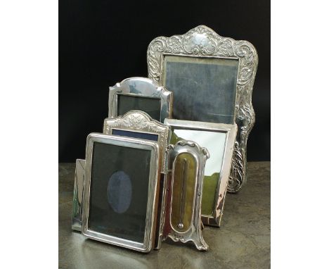 A collection of six silver mounted photograph frames, various makers, Birmingham, London and Sheffield, dated from 1905 to 20