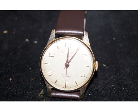 9ct Gold cased roamer manual wind vintage wristwatch currently ticking &amp; keeping good time