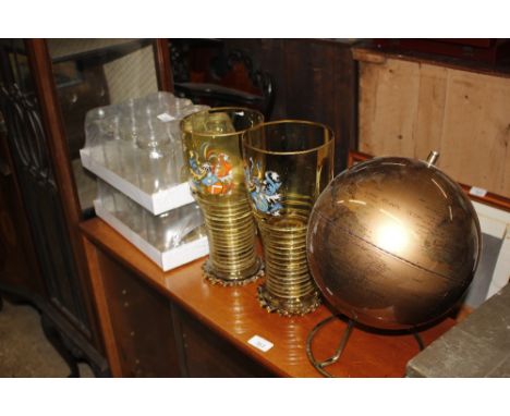 A pair of German glass steins with enamel decoration; a World globe and a collection of vintage jam jars