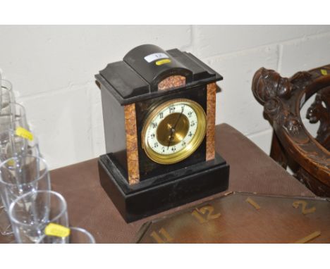 A Victorian marble cased mantel clock