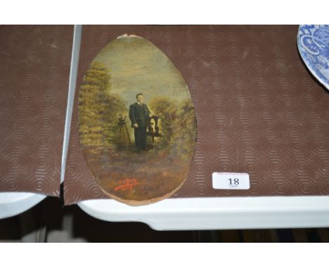 An oval overpainted portrait print of a young gentleman 