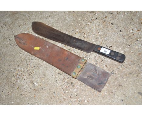 A WW2 period machete in scabbard