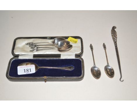Six silver Apostle teaspoons; a cased silver teaspoon and a silver handled button hook