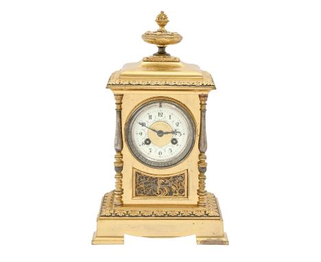 A French gilt and silvered brass mantel clock, of pillar shape with primrose enamel dial and gong striking movement, pendulum