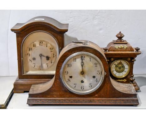 An oak Napoleon mantel clock, c. 1930, silvered dial with Arabic numerals, 42cm w, another two mantel clocks, similar, (3)  S