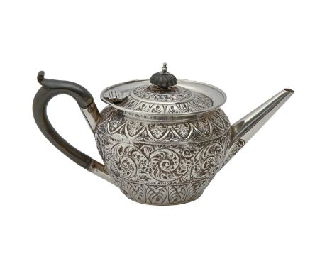 A Victorian silver teapot, chased with scrolling foliage, 10cm h, marks rubbed, London 1889, 7ozs 18dwts  Light wear and mino