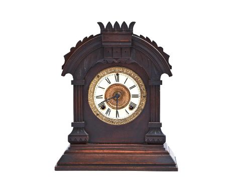 A North American stained wood shelf clock, Ansonia Clock Co New York, patented June 18 1892, with gong striking movement, pen