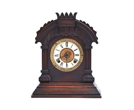 A North American stained wood shelf clock, Ansonia Clock Co New York, patented June 18 1892, with gong striking movement, pen