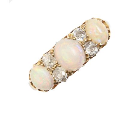An opal and diamond ring, early 20th c, marked 18, other marks rubbed, 5g, size N  One opal possibly a replacement, the other