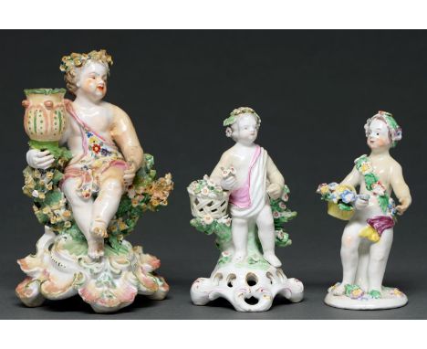 A Bow candlestick figure and two smaller Bow figures of child flower gatherers, c1765-1770, 12.5-17cm h  Old restoration