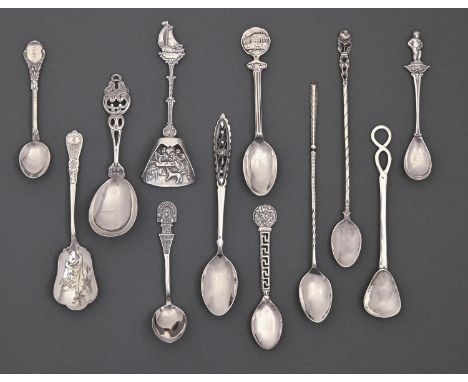 Miscellaneous foreign silver souvenir and ornamental spoons and a Dutch caddy spoon, with fishing boat terminal, 6ozs 8dwts  