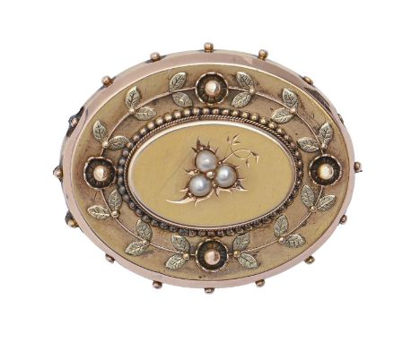 A Victorian two colour gold brooch, set&nbsp; with three split pearls, 38mm, 8g  Light scratches and wear, base metal pin