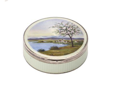 A Swiss silver and enamel box, early 20th c, the lid painted with a lake landscape, the border and sides in eau de nil guillo