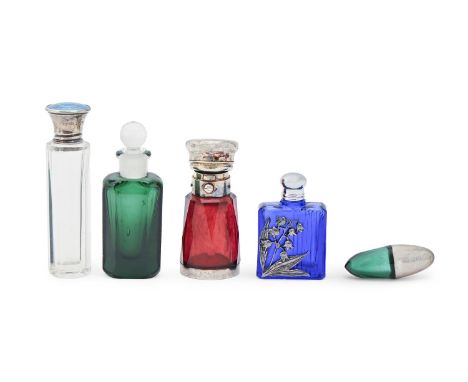 A Victorian silver capped faceted ruby glass scent bottle, a bean shaped green glass example with silver cap, another with si