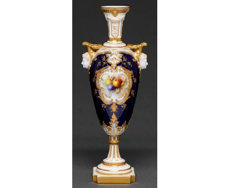 A Royal Worcester mask handled vase, c1930, painted by Chivers, signed, with fruit in raised gilt cartouche reserved on a cob