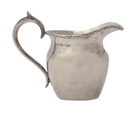A George V silver cream jug, 90mm h, by H C Davis, Birmingham 1919, 2ozs 15dwts  Light wear and minor dents