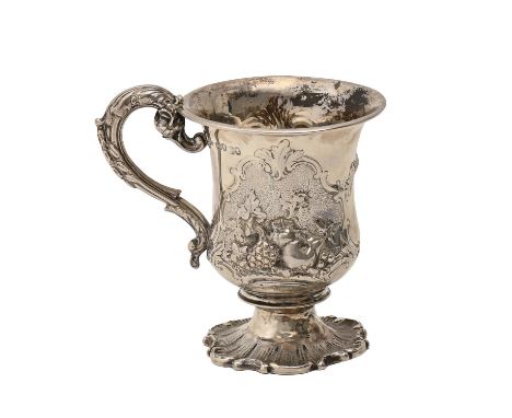 A Victorian silver christening mug, of campana shape, chased with reserves of fruit, on spool foot, 10.5cm h, by Charles Fox,