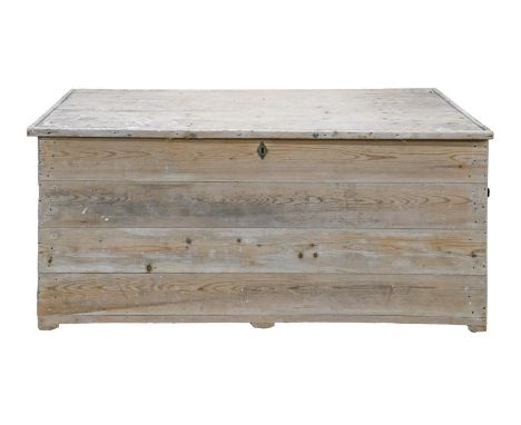 A Victorian or Edwardian boarded pine trunk, 62cm h; 59 x 140cm  Hinges damaged or lacking, much bespattered with bird lime a