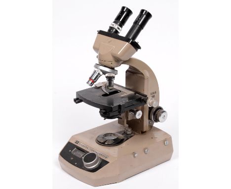 A compound binocular industrial microscope, Vickers Instruments 1960's, with eyepieces, quadruple nose turret with three lens