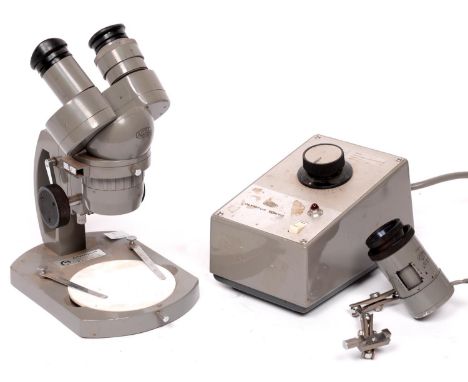 A compound binocular dissecting microscope, Olympus Tokyo VT-II No. 212739, circa 1970, with X20 eyepieces, illuminated nose 