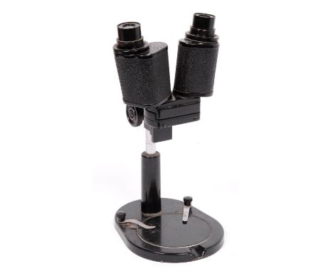 A Soviet Russian compound binocular microscope, third quarter twentieth century, with eyepieces and plywood case  Good condit
