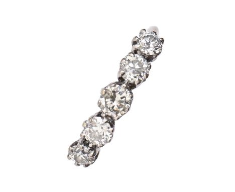 A diamond five stone ring, with old cut diamonds in white gold marked 18ct, 2.9g, size M  Light wear to hoop