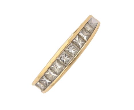 A diamond ring, with row of princess cut diamonds, in 18ct gold, 4.2g, size P  Light wear