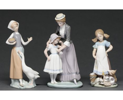 Two Lladro figures and a group, late 20th c, 27cm h and smaller, printed mark  Good condition