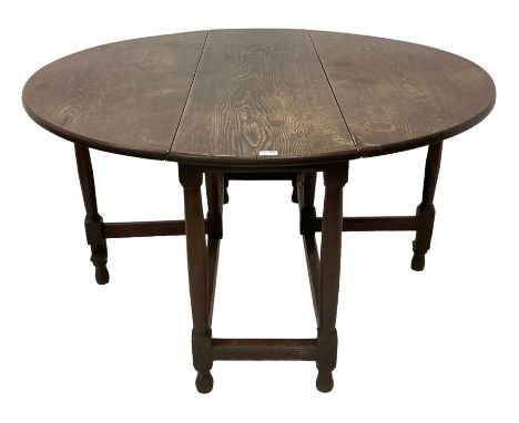 18th century oak dining table, oval drop-leaf top on gate-leg action base, on turned supports united by moulded stretchersDim