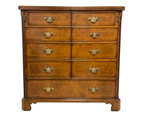 Television media cabinet disguised as a Georgian Bachelor's chest, false fold-over top over two doors disguised as nine false