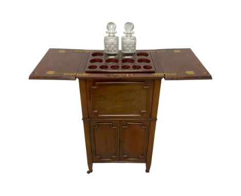 Edwardian mahogany drinks cabinet, the moulded rectangular top hinges to reveal lift-up tray with decanter and glass holder, 